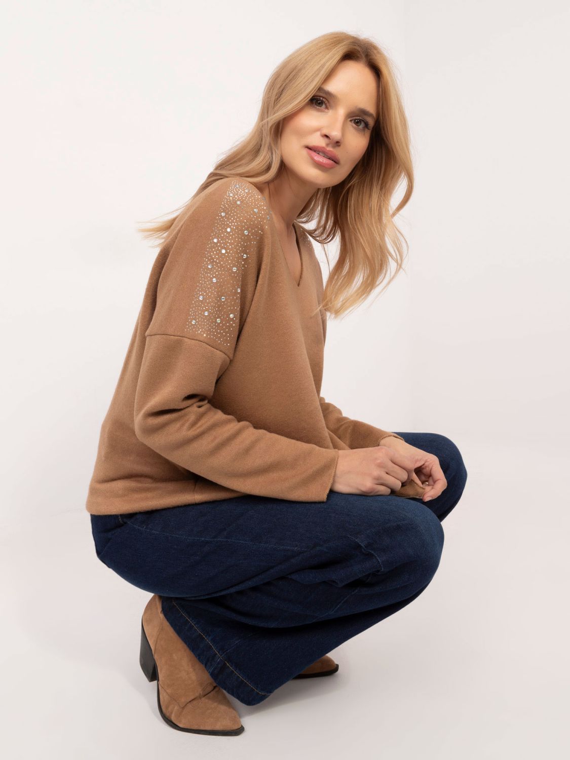 Eleganter Pullover mit Applikation