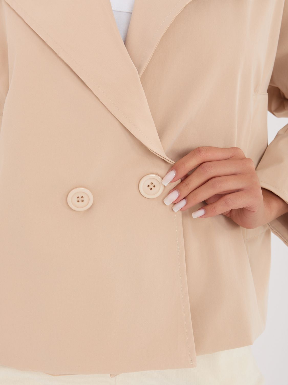 Kurzer Übergangsmantel in Braun