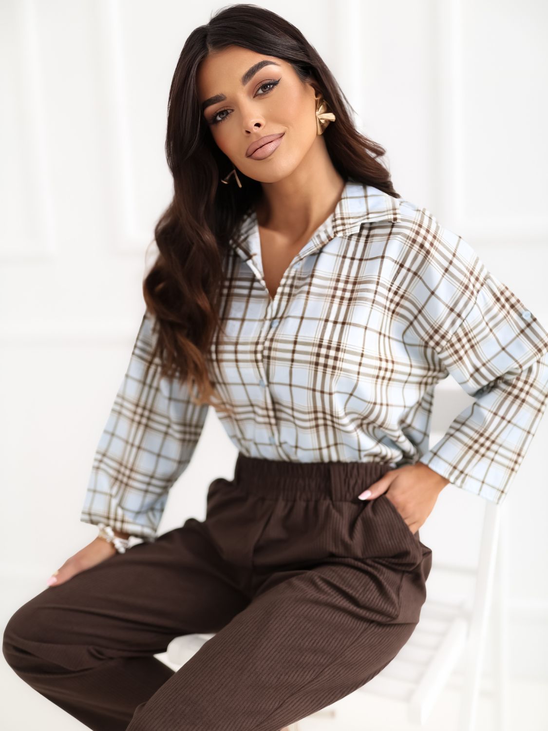 Hellblaue karierte Bluse