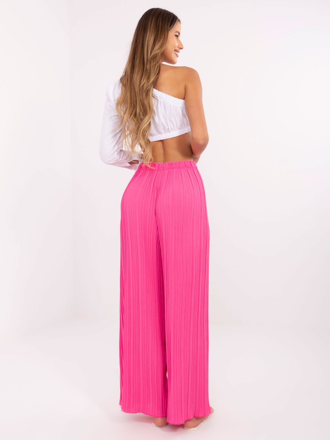 Stylische fluoreszierende rosa Hose