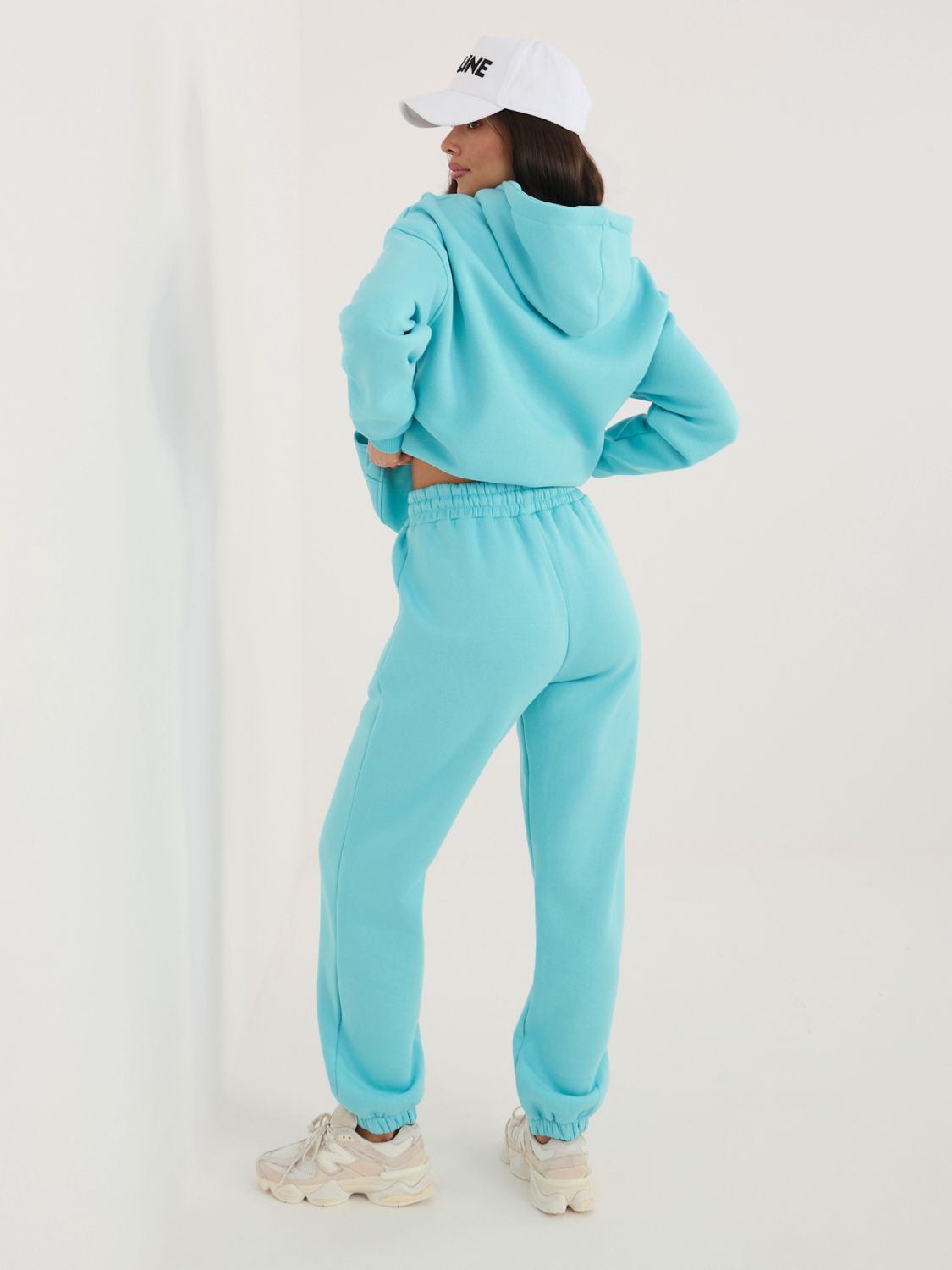 Damen-Set in Türkis mit Kapuze und langen Ärmeln