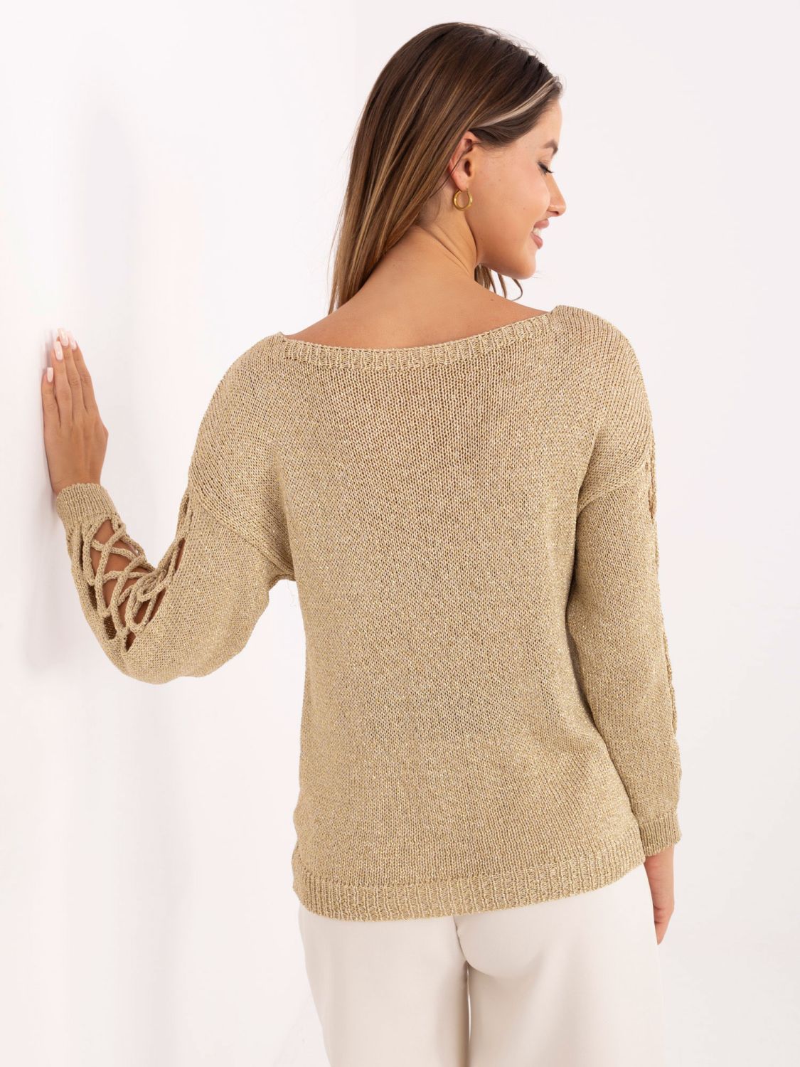 Eleganter goldener Pullover