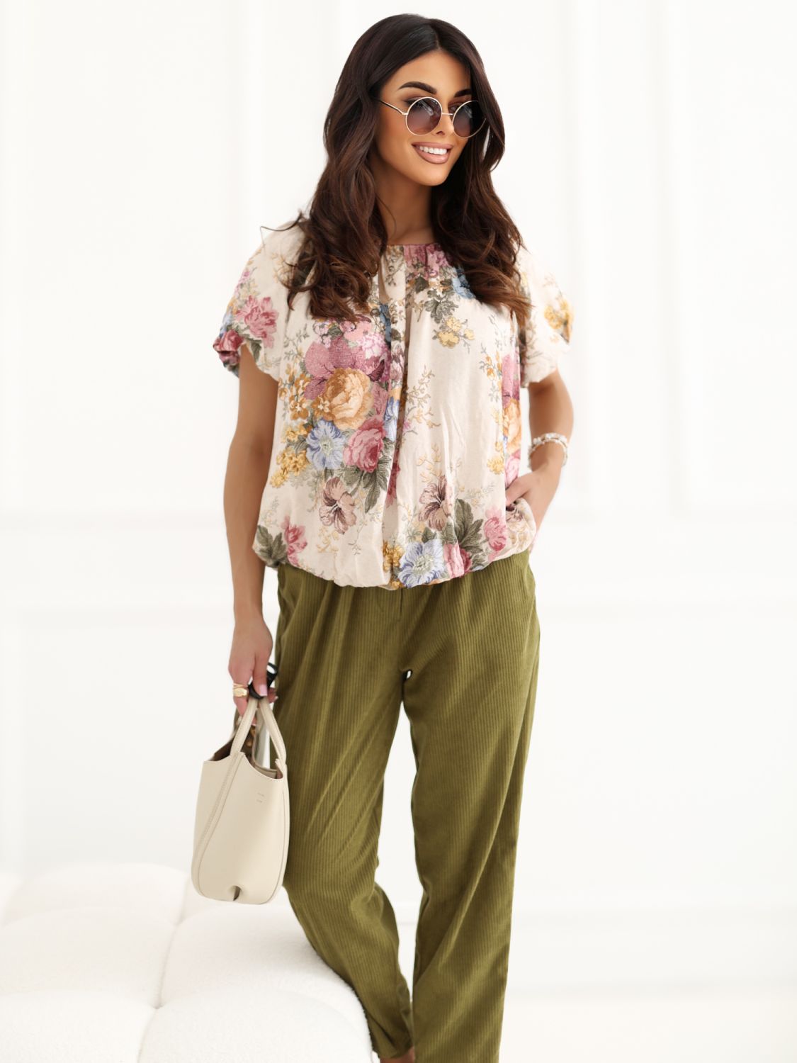 Gelbe Bluse mit Blumenmuster und Puffärmeln