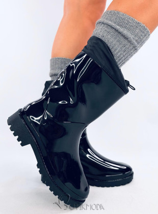 Glänzende schwarze Gummistiefel