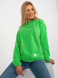 Grüne Sweatshirt mit Kapuze und Aufnäher