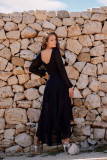 Asymmetrisches schwarzes Maxi-Kleid mit langen Ärmeln