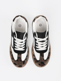 Schwarz-weiße Sneakers mit Leoparden-Details