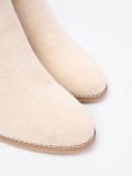 Helle beige Stiefeletten mit Blockabsatz und dekorativer Schnalle