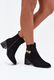 Gefütterte schwarze Stiefelette mit goldener Verzierung und Blockabsatz