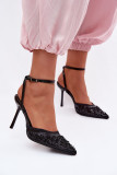 Schwarze Sandale mit Stiletto-Absatz und Verzierungen