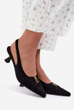 Schwarze Pumps mit offener Ferse und dekorativem Detail