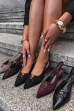 Schwarze Pumps mit offener Ferse und dekorativem Detail