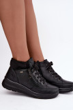 Schwarze Keilabsatz-Stiefelette mit Fellfutter