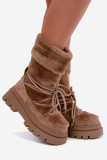 Beige Schneestiefel mit Fellbesatz auf Plateausohle