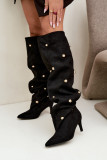 Schwarze Overknee-Stiefel mit Stiletto-Absatz und goldenen Details