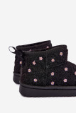 Schwarzer Schneestiefel mit kleinen Blumen und Fell