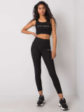 Schwarzes gestreiftes Sportset