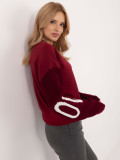 Stylischer roter Pullover