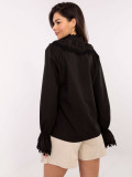 Elegante schwarze Bluse mit Spitze