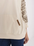 Elegante Bluse mit Stickerei in hellem Beige