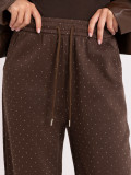 Braune weite Sweatpants mit Applikation