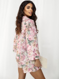 Rosa Shorts mit Blumenmuster, weitem Bein und Gürtel