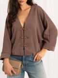 Eleganter beigefarbener Pullover mit V-Ausschnitt
