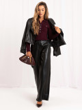 Eleganter lila Pullover mit Kragen und Knöpfen