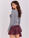 Eleganter grauer Pullover mit Wickelausschnitt