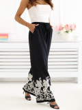 Schwarze Wide-Leg-Hose mit Stickerei