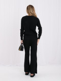 Schwarzes Set mit Strickjacke und weiten Hosen