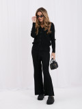 Schwarzes Set mit Strickjacke und weiten Hosen