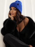 Blaue Wintermütze mit Applikation
