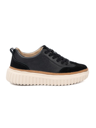 Schwarze Leder-Sneakers auf beiger Plattform