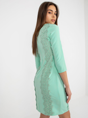 Mintgrünes Cocktailkleid mit Blumenapplikation